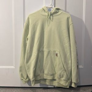 Woman’s light yellow Carhartt hoodie